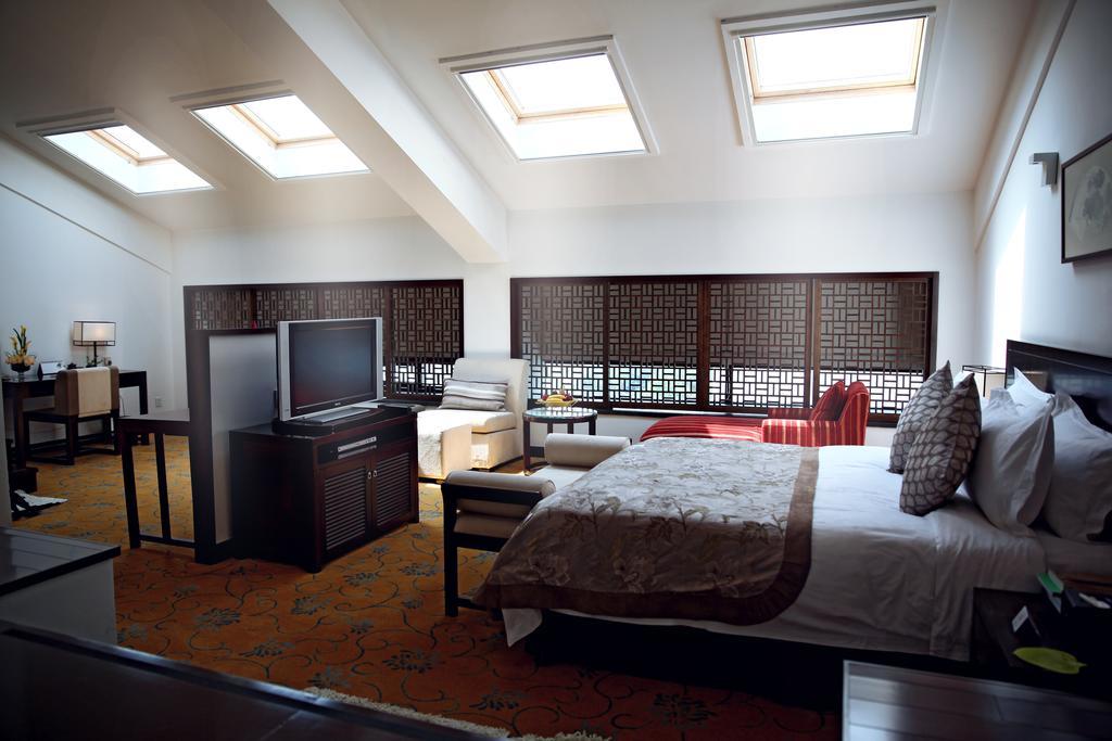 Garden Hotel Suzhou Суджоу Стая снимка
