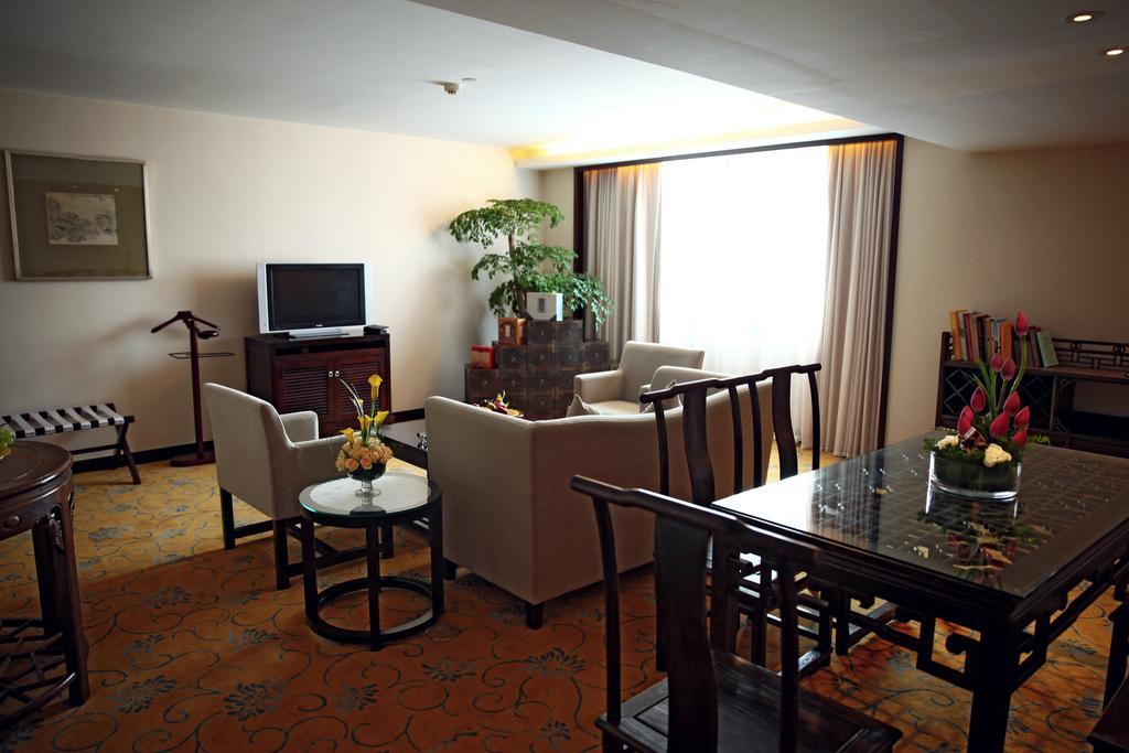 Garden Hotel Suzhou Суджоу Стая снимка